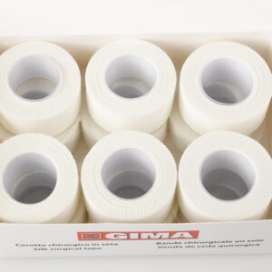 Esparadrapo de seda GIMA en rollo de 10 m × 2,5 cm – Cinta quirúrgica blanca para fijación de apósitos (Ref. 34787) | Caja de 12 rollos